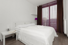 Mokotów Bernardyńska Apartment with Balcony by Noclegi Renters Warsaw